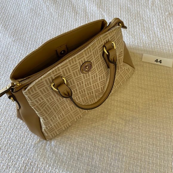 Anne Klein Engraved Lion Logo Gold-Tone Zippered Clutch - Picture 8 of 9